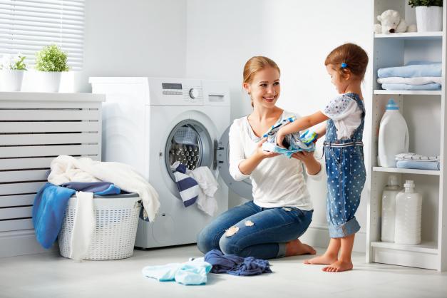 Clothes Drying Mom with kid - Sippin Energy Products